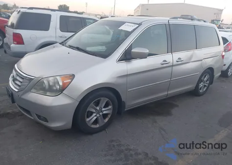2008 Honda Odyssey Touring z USA, uszkodzony, nr VIN 5FNRL38948B114891
